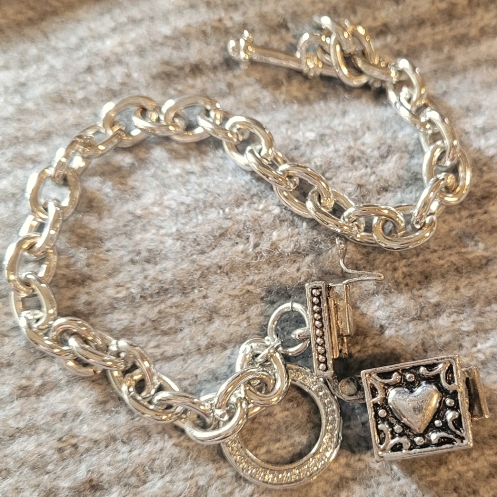Silver bracelet with box charm ..